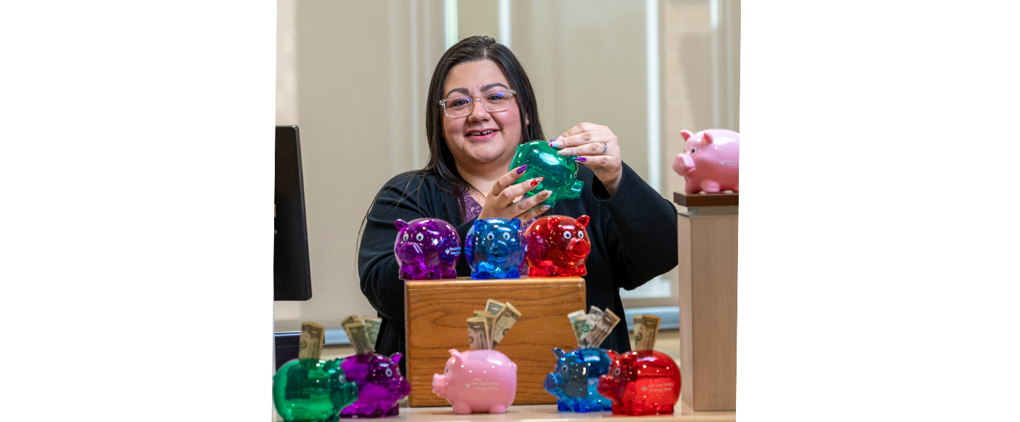 Robin with piggy banks