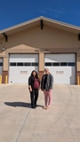 SLVFB employees presenting a We Care, We Share donation to Alamosa Fire Department