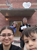 SLVFB employees presenting a We Care, We Share donation to Center Viking Club