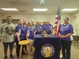 SLVFB employees presenting a We Care, We Share donation to Monte Vista Elks Club