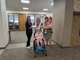 SLVFB employees presenting a We Care, We Share donation to SLV PACC