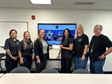 SLVFB employees presenting a We Care, We Share donation to San Luis Valley Regional Emergency Trauma Advisory Council - SLV RETAC
