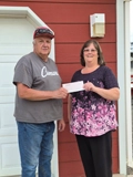 SLVFB employees presenting a We Care, We Share donation to San Luis Valley TV C/O Kelly Cornum